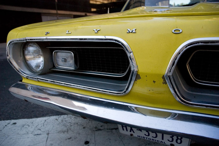 An old Plymouth Barracuda, viewed from the front.