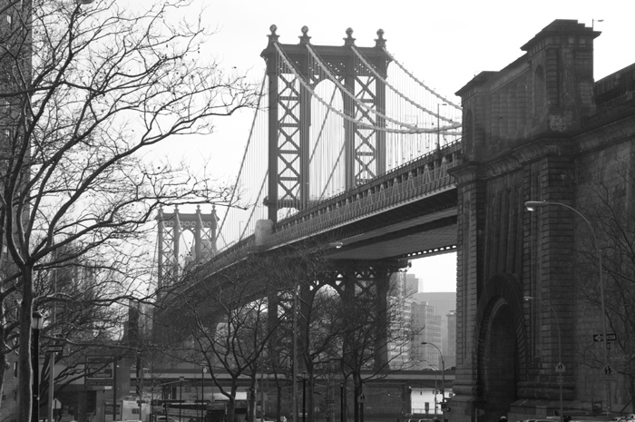 The Manhattan Bridge stretches across the East River, to Brooklyn and out of view.