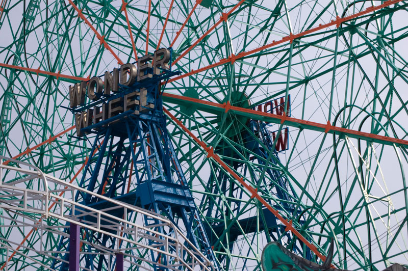 Detailed photo of the many supports within a ferris wheel.