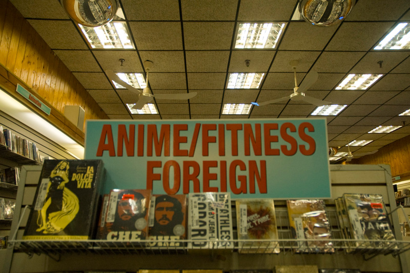 A sign in a DVD store, for a section of mixed genres.