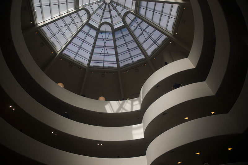 Concentric balconies leading up to a skylight.