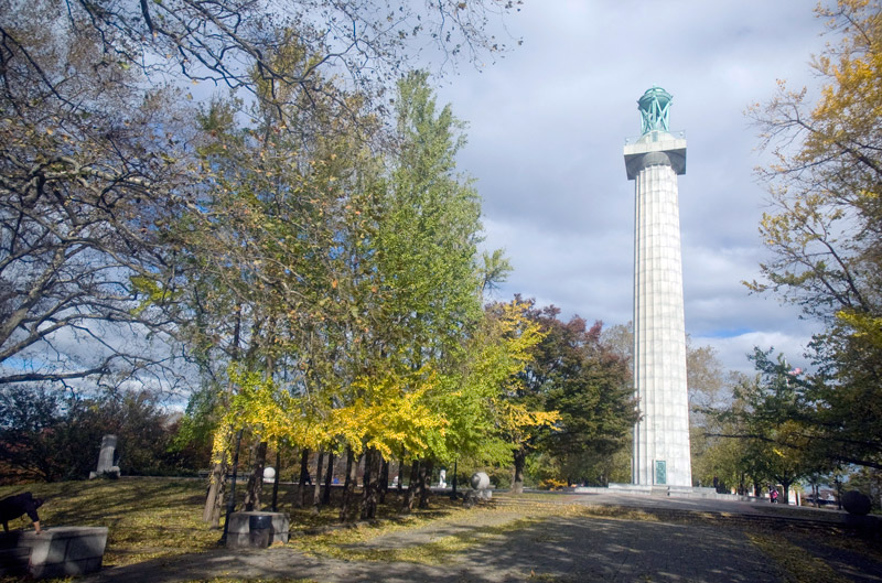 A tall column on a plaza