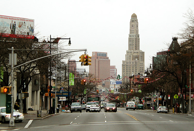 A city street, with skyscrapers in the background