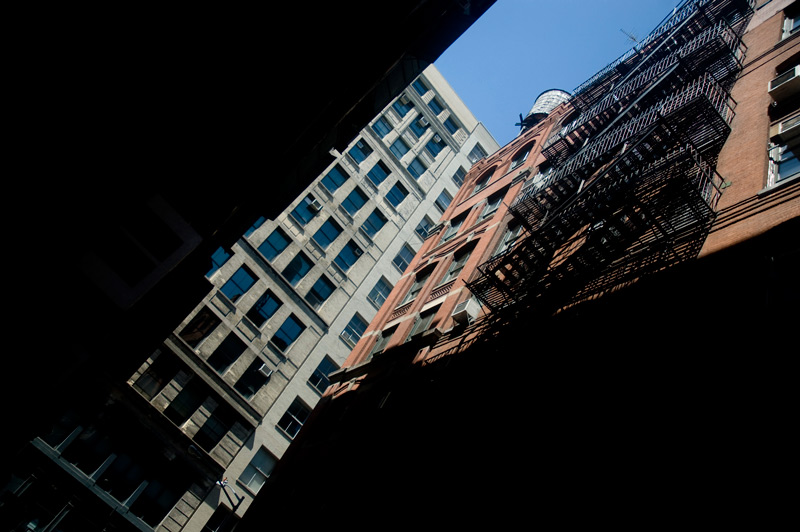 Narrow space between buildings, and sky