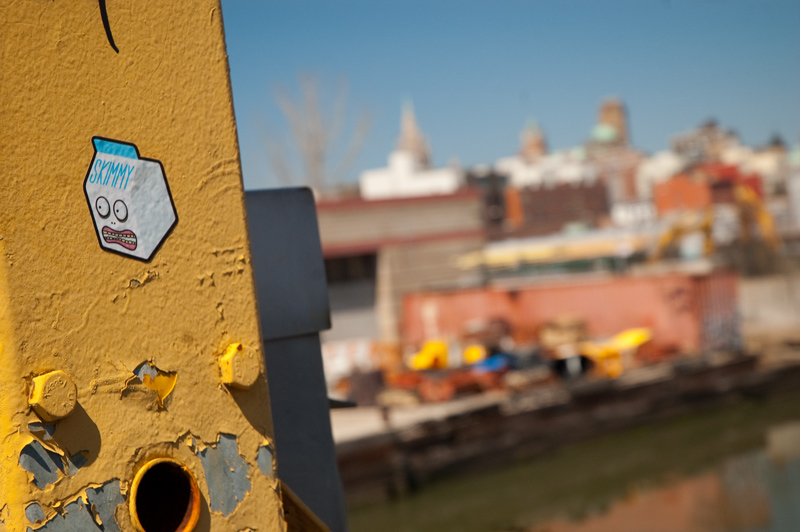 A sticker of a milk container on a bridge part.