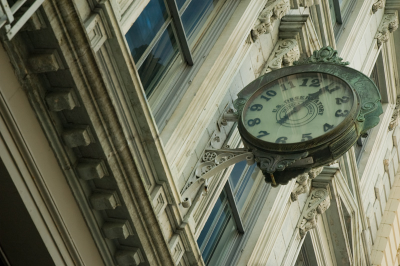 An ornate clock on a building.