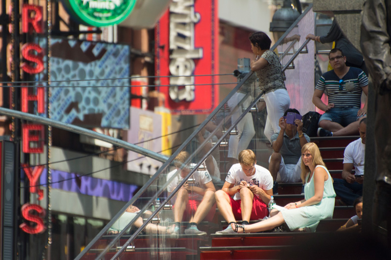 Two tourists in Times Square.