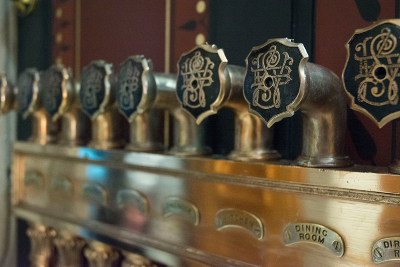 A row of ornate speaking tubes