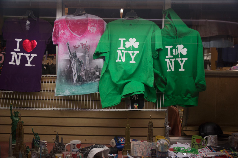 I 'Shamrock' NY t-shirts and hoodies in a shop window.