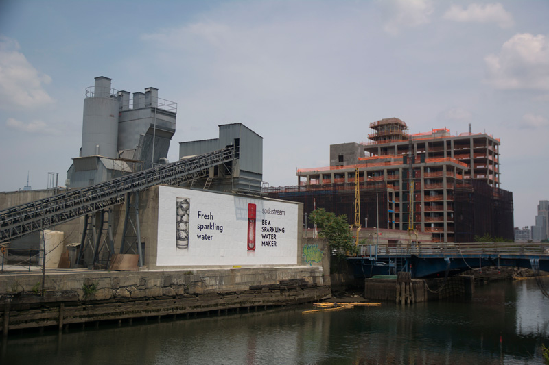 A wall sign for Soda Stream, next to the toxic Gowanus Canal.