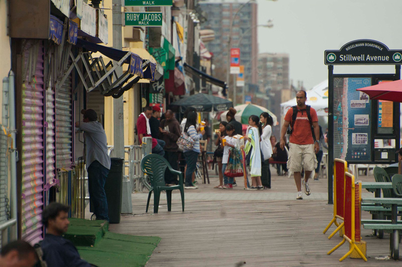 People on Coney Island's Boardwalk.