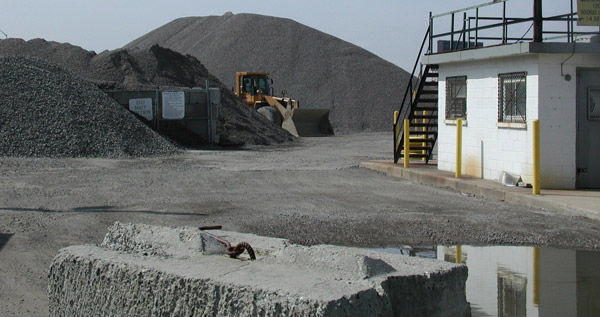 Piles of sand
and gravel, with a bulldozer.
