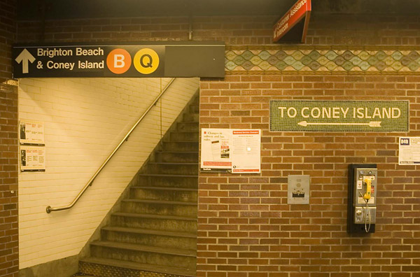 A sign directs people to stairs leading to Coney Island
trains.